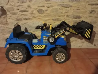 Tractor Azul con Pala.La batería hay que cambiarla