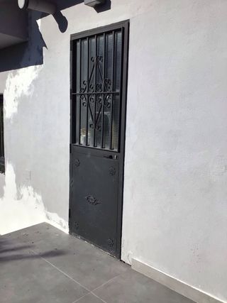 Puerta de hierro completa