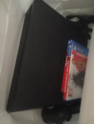 PS4 Negra + 2 Juegos + Mando funciona perfectament
