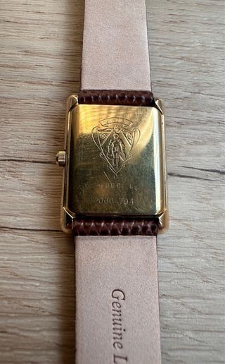Reloj Gucci oro