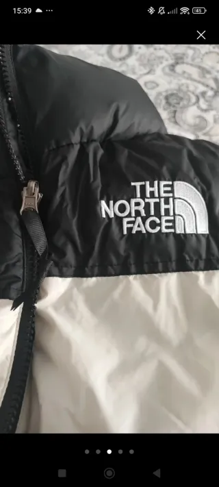 Cazadora The North Face blanca y negra