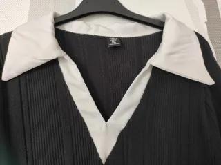 Maglia nera colletto bianco