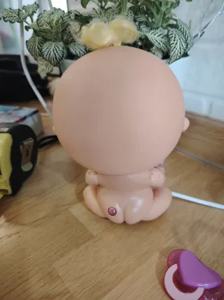 Muñeca bebé con chupete bellies