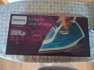 Plancha Philips y tabla de planchar