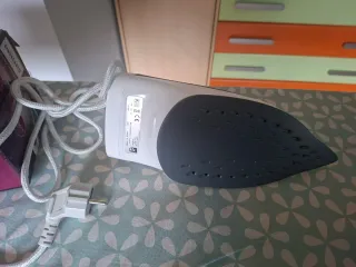 Plancha Philips y tabla de planchar