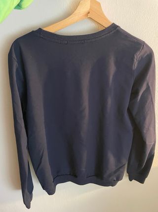 Jersey azul marino con flecos