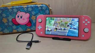 Nintendo Switch Lite Rosa + Custodia Kirby