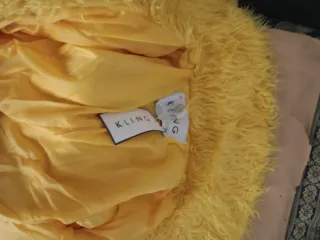 Abrigo peludo amarillo Kling. De mujer