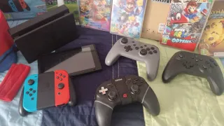 Nintendo Switch con giochi e controller