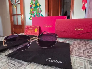 Gafas de sol Cartier doradas y negras