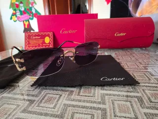 Gafas de sol Cartier doradas y negras