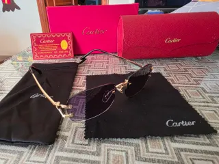 Gafas de sol Cartier doradas y negras