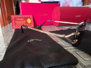 Gafas de sol Cartier doradas y negras