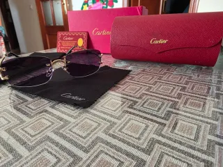 Gafas de sol Cartier doradas y negras
