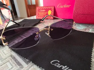 Gafas de sol Cartier doradas y negras