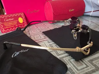 Gafas de sol Cartier doradas y negras