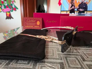 Gafas de sol Cartier doradas y negras