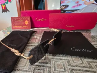 Gafas de sol Cartier doradas y negras