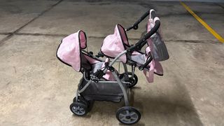 Coche de muñeca gemelar rosa