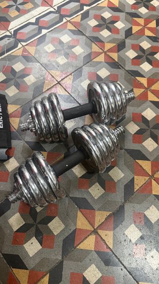 Banco de pesas multifunción mas discos mas barras