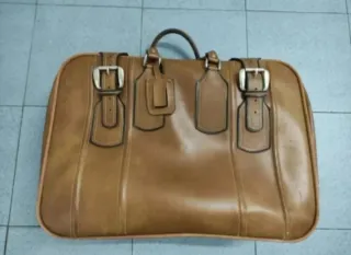 Maleta de piel vintage marrón