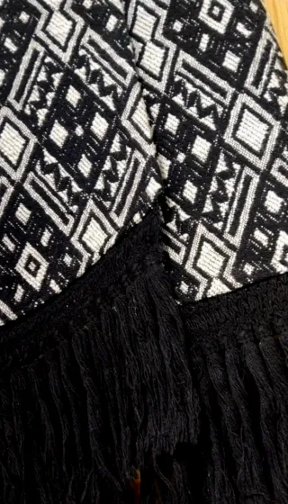 Falda mini étnica Stradivarius con flecos