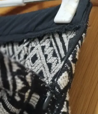 Falda mini étnica Stradivarius con flecos