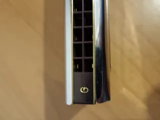 Armonica a bocca a doppia tonalità.