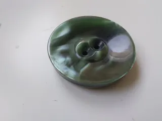 Botones verdes antiguos para abrigo