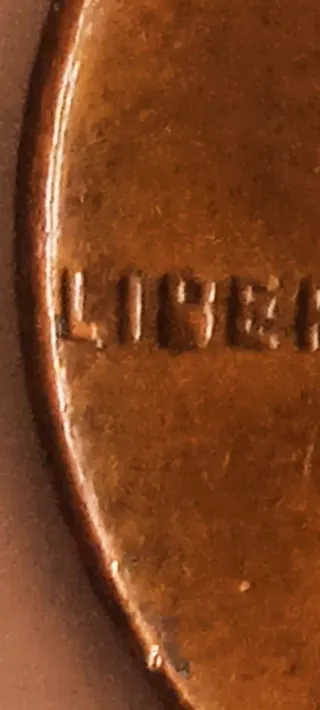 MONEDA 1 CENTAVO LINCOLN.1957D.EXCESO METAL B.