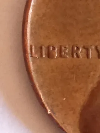 MONEDA 1 CENTAVO LINCOLN.1957D.EXCESO METAL B.