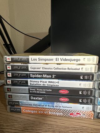 Console PSP Sony Nera + 8 giochi e 6 film.