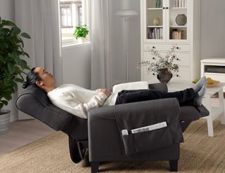 Sillón reclinable de tela gris