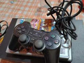PlayStation 2 Nera con giochi