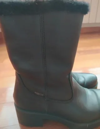 Botas de piel negras con protección lluvia