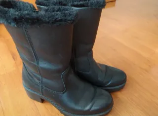 Botas de piel negras con protección lluvia