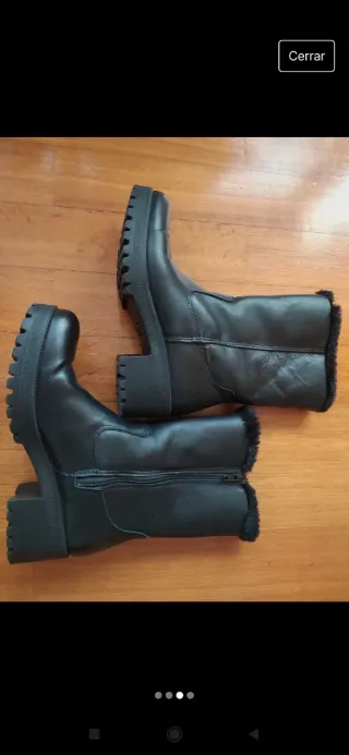 Botas de piel negras con protección lluvia