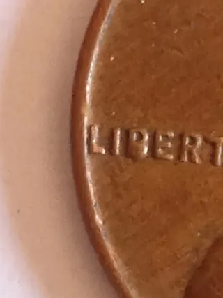 MONEDA 1 CENTAVO LINCOLN.1958D.EXCESO METAL EN B.