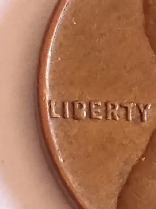 MONEDA 1 CENTAVO LINCOLN.1958D.EXCESO METAL EN B.