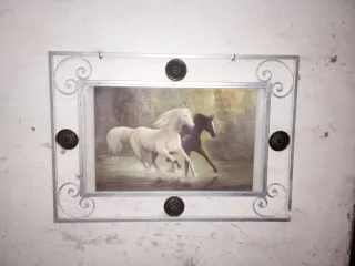 Cuadro de hierro y latón con caballos