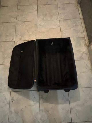 Maleta de viaje azul marino con ruedas