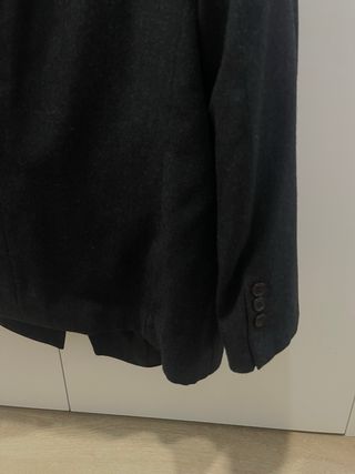 Traje de chaqueta y pantalón negro