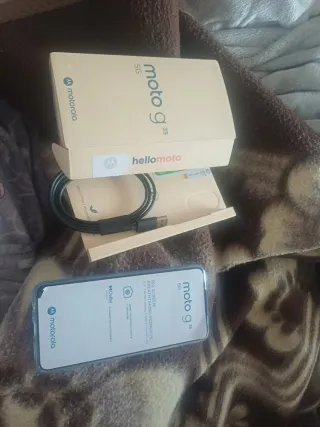 Motorola G35 5G con cargador , caja y funda