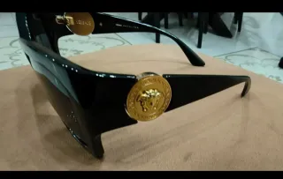 Occhiali da sole Versace donna neri e oro