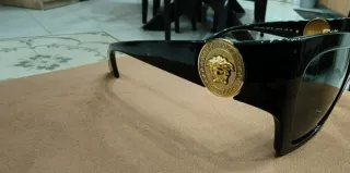 Occhiali da sole Versace donna neri e oro