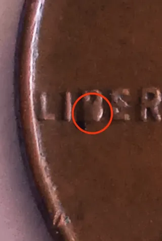 MONEDA 1 CENTAVO LINCOLN.1957D.ERROR EXCESO METAL.