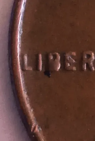 MONEDA 1 CENTAVO LINCOLN.1957D.ERROR EXCESO METAL.