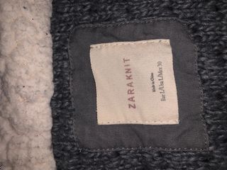 Gilet grigio a maglia con cappuccio in pile sherpa