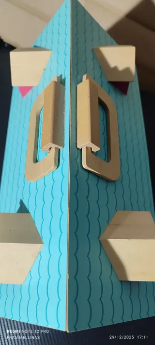 Casa de muñecas de madera