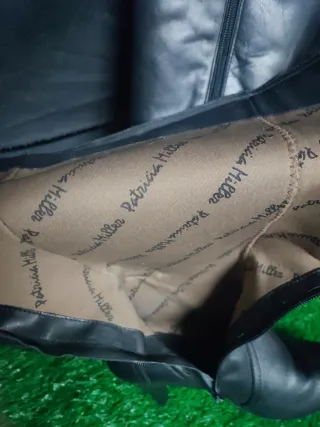 Botas altas de cuero negras para mujer